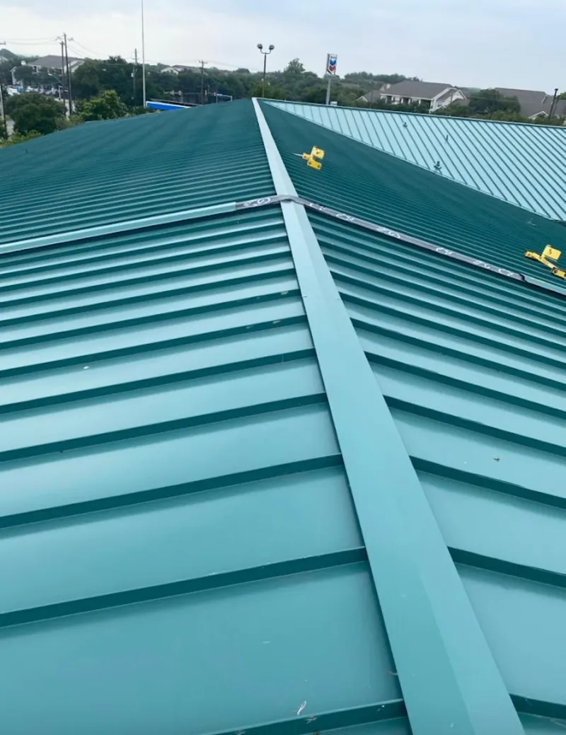 Green commercial metal roof ridge and valley for Metal Roof Repair in Snyderville
